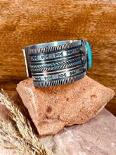 Load image into Gallery viewer, right side of cuff showing detailed art work