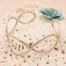 Load image into Gallery viewer, Silver Hammered Infinity Cuff
