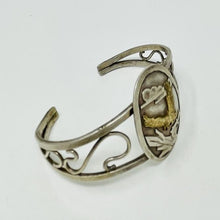 Load image into Gallery viewer, Vintage Navajo Cuff with Flying Gold Eagle on Centerpiece
