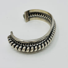 Load image into Gallery viewer, Navajo Silver Cuff with Spiral Center Surrounded by Smaller Spirals and Stampwork
