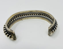 Load image into Gallery viewer, Navajo Silver Cuff with Spiral Center Surrounded by Smaller Spirals and Stampwork
